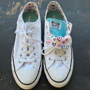 Women’s Converse sneakers size 10 with double tongue.